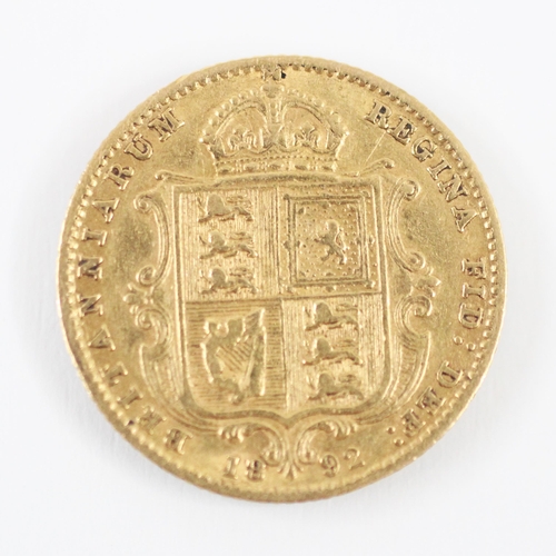 427 - A Victorian half sovereign, with shield back, dated 1892, 4gms