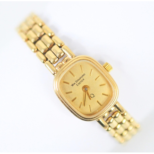 467 - A 9ct yellow gold ladies ‘Wm Bruford’ quartz wristwatch, the cream-coloured rectangular dial with ba... 