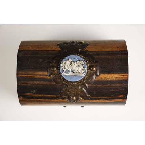 560 - A Pearce of London coromandel casket, mid 19th century, modelled as a domed trunk of small proportio... 