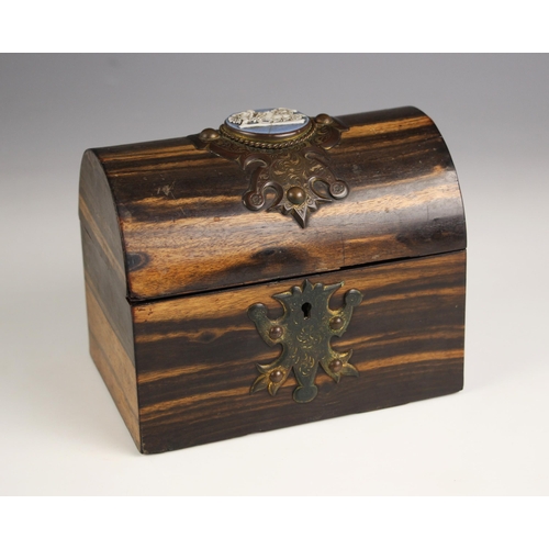 560 - A Pearce of London coromandel casket, mid 19th century, modelled as a domed trunk of small proportio... 