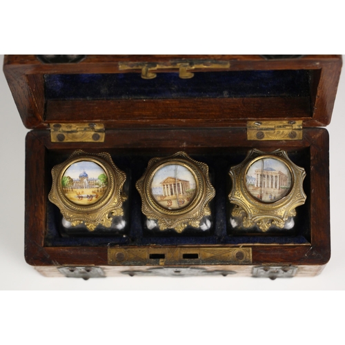 561 - A Grand Tour oak cased inkwell set, early 19th century, modelled as a domed trunk of small proportio... 