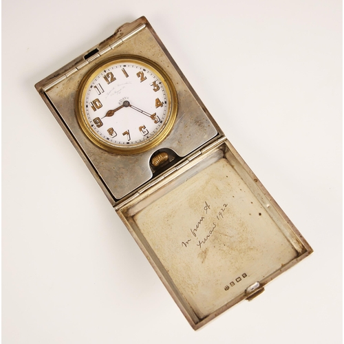 91 - A silver cased travel eight day timepiece, William Neale Ltd, Birmingham 1920, engraved inscription ... 