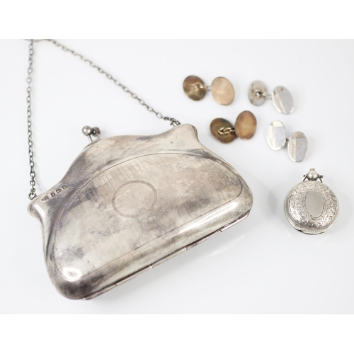 123 - A George V silver coin purse, G Norman, Birmingham 1917, with engine turned detail and central circu... 