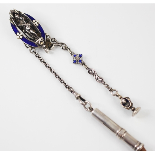 100 - An early 20th century enamel and white metal chatelaine, the oval clip with blue enamel border and c... 