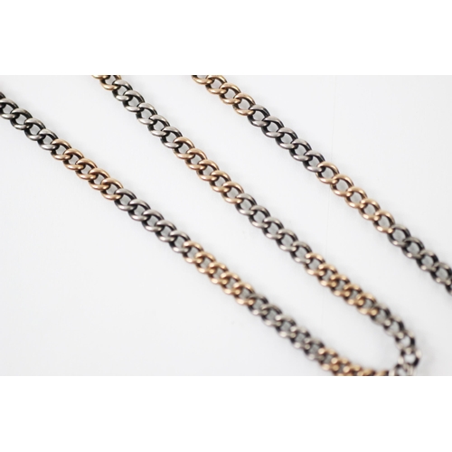 201 - A 19th century untested white and yellow metal guard or albert chain, the two tone curb link chain w... 