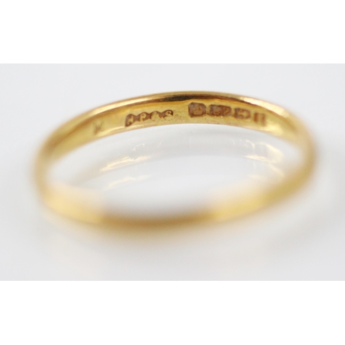 261 - A 22ct yellow gold wedding band, stamped 'HWLd' Birmingham 1916, ring size P, with a further 22ct ye... 