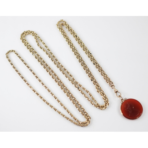 262 - A 20th century yellow metal guard chain, the fancy link chain suspending lobster clasp with circular... 