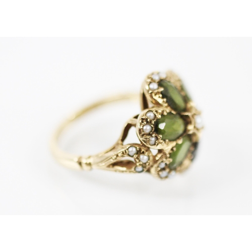 185 - A Victorian style untested tourmaline and seed pearl ring, the six oval cut tourmalines designed wit... 