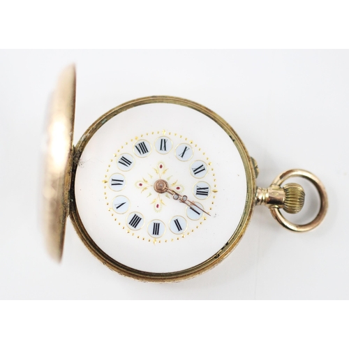 452 - A yellow metal ladies fob watch, the circular white dial with Roman numerals and gilt decorations, s... 