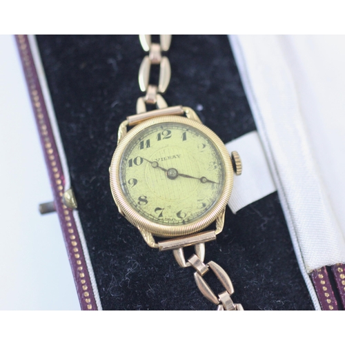 453 - A ladies yellow metal 'Vilray' wristwatch, the circular dial with Arabic numerals, set to a engraved... 