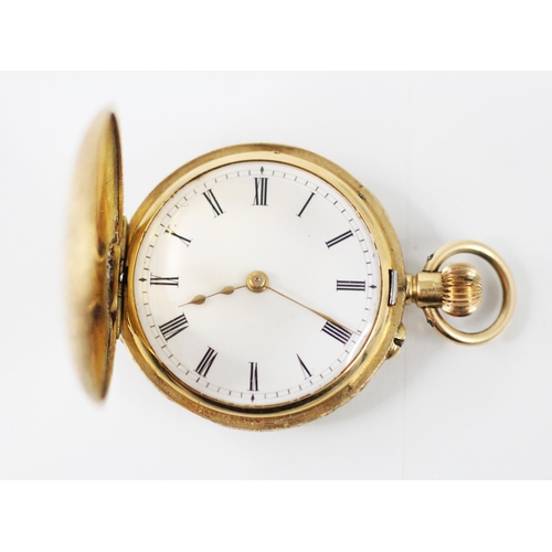 454 - A yellow metal ladies half hunter pocket watch, the white enamel dial with Roman numerals, set to a ... 