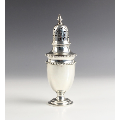 124 - A George V silver sugar caster, S W Smith and Co, Birmingham 1926, the pierced pull off cover above ... 