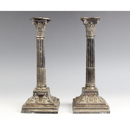 125 - A pair of Victorian silver candlesticks, Mappin Bros Sheffield 1898, of traditional Corinthian colum... 