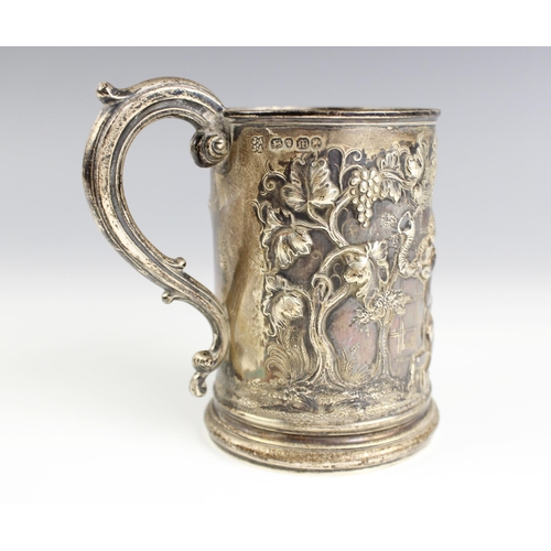 126 - A silver mug Joseph Angell I & Joseph Angell II, London 1847, embossed in high relief with frolickin... 