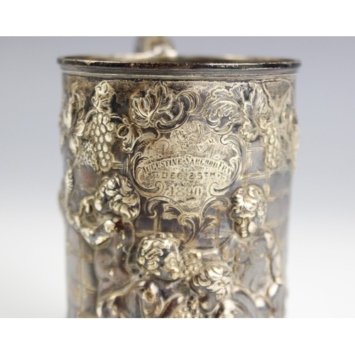 126 - A silver mug Joseph Angell I & Joseph Angell II, London 1847, embossed in high relief with frolickin... 