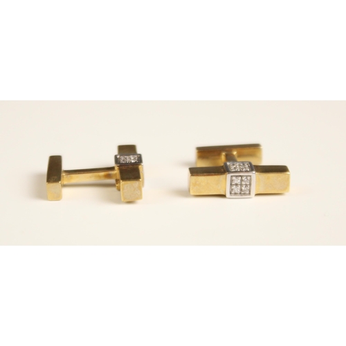 385 - A pair of diamond and 9ct yellow gold cufflinks, the cufflinks designed as a yellow gold rectangular... 