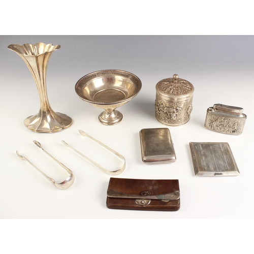 75 - A selection of silver and white metal items, including a George V silver cigarette box, Horace Woodw... 