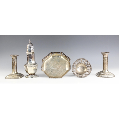 78 - A selection of silver to include a Britannia standard silver sugar caster Harry Freeman, London 1910... 