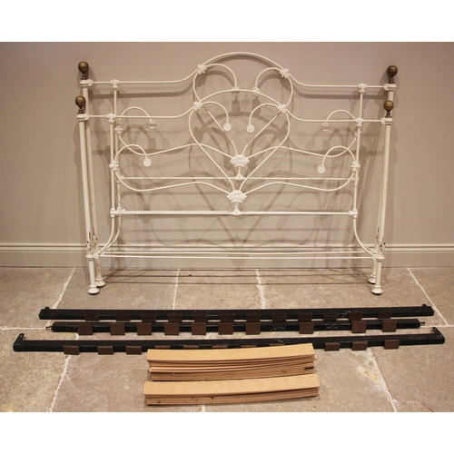 1190 - A Victorian style painted iron bed, the head and foot boards of openwork, scroll and roundel form, w... 