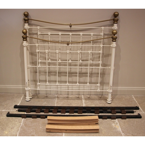 1190 - A Victorian style painted iron bed, the head and foot boards of openwork, scroll and roundel form, w... 