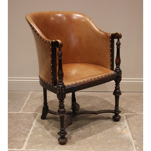 1211 - A Carolean revival stained beech and tan leather tub chair, early 20th century, the leather upholste... 