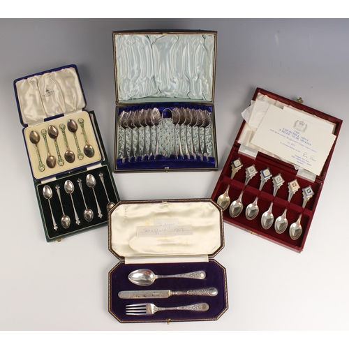 61 - A cased of silver and enamel teaspoons, Turner and Simpson, Birmingham 1935, the teaspoons with whit... 