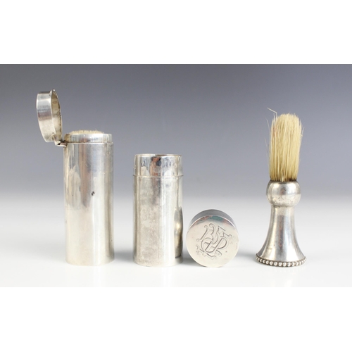 66 - An Edwardian silver travel shaving brush case, Finnigans Ltd, London 1909, of cylindrical form with ... 