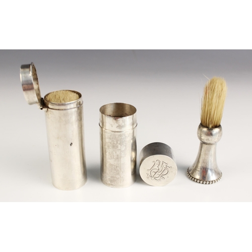 66 - An Edwardian silver travel shaving brush case, Finnigans Ltd, London 1909, of cylindrical form with ... 