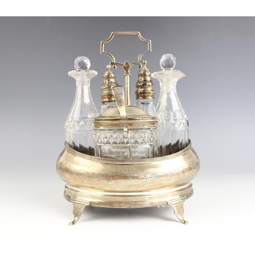 67 - A George III silver five bottle cruet set, possibly Alexander Field, London 1805, the oval stand wit... 