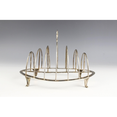 69 - A George III silver toast rack, Nathaniel Smith & Co, Sheffield 1797, the circular plain polished th... 