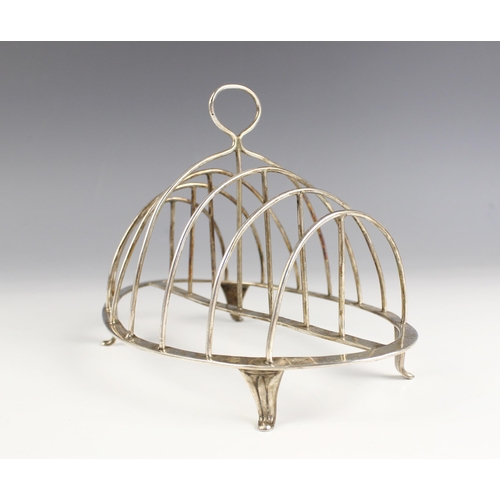 69 - A George III silver toast rack, Nathaniel Smith & Co, Sheffield 1797, the circular plain polished th... 