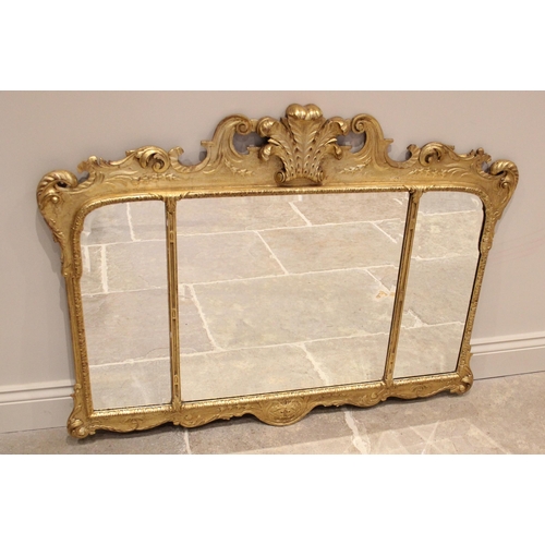 1063 - A George II style giltwood and gesso overmantel triple plate wall mirror, the Prince of Wales feathe... 