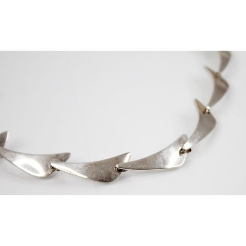 235 - A Niels Erik From silver 'Peak' style bracelet, the bracelet designed as eight overlapping plain pol... 