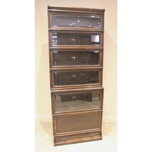 1194 - An oak 'Globe-Wernicke & Co' six tier stacking bookcase, early 20th century, the tiers with glazed '... 