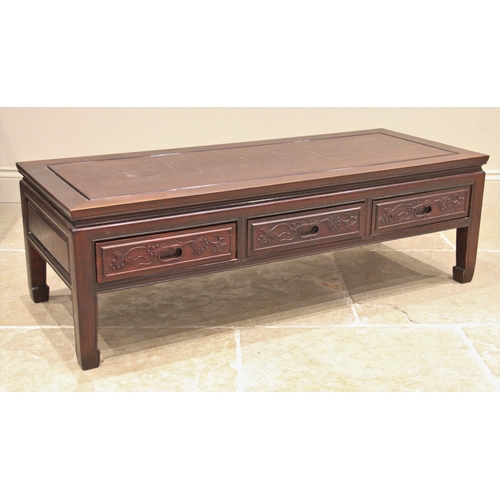 1216 - A Chinese rosewood kang or coffee table, late 20th century, the rectangular panelled top over three ... 