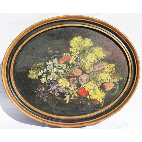 662 - E. Mayer (English school, early 20th century),  
An oval floral still life,  
Oil on board,  
Signed... 