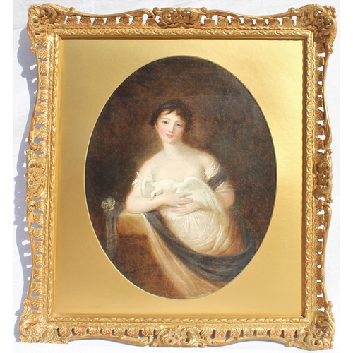 683 - French School (late 18th century),  
An oval mounted half length portrait of a seated young lady in ... 