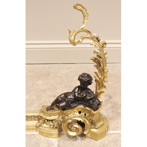 997 - A Louis XVI style ormolu and bronze fender, 20th century, the terminals cast with an upright acanthu... 