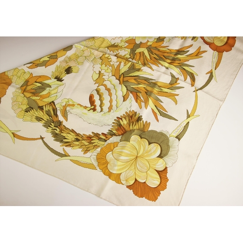 1025 - An Hermes silk scarf, in the 'Tahiti' pattern, in yellow, orange and olive tones, with rolled hems, ... 