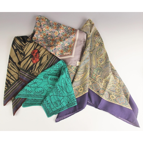 1030 - Four Liberty of London silk scarves, to include; a paisley pattern scarf in navy, green and brown to... 