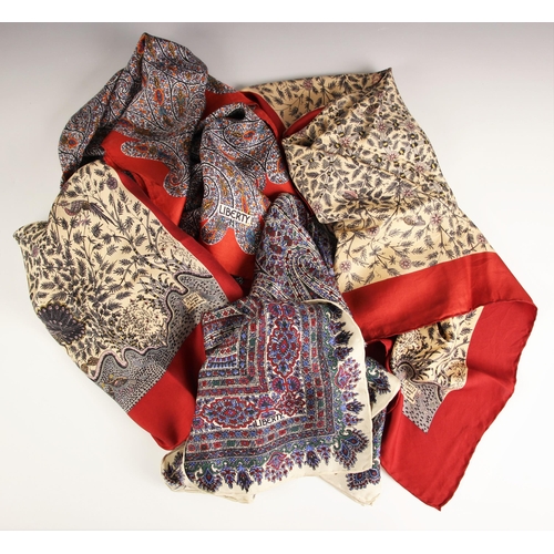 1032 - Four Liberty of London silk scarves, to include; two tree of life pattern scarves, within a red bord... 