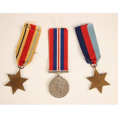 960 - A World War II three, comprising the War Medal 1939-1945, the Africa Star with 8th Army bar, and the... 