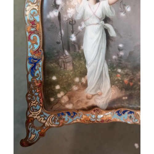 794 - A French porcelain plaque, late 19th century, depicting a classical maiden beneath a prunus tree, wi... 