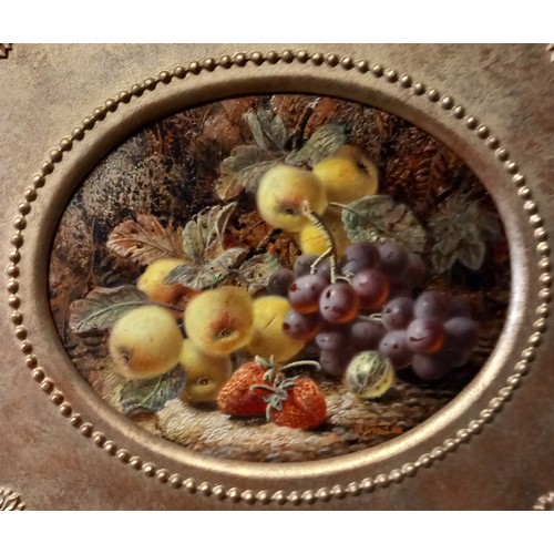 679 - Oliver Clare (British, 1853-1927),  
Two oval still lives depicting fallen fruit,  
Oil on board,  
... 