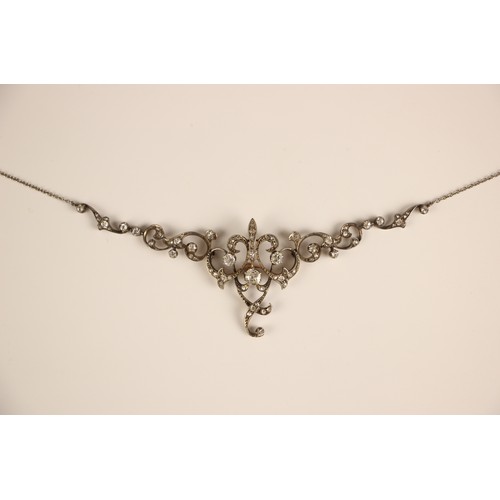 192 - A late 19th century diamond swag necklace/brooch, the central openwork detachable brooch with four o... 