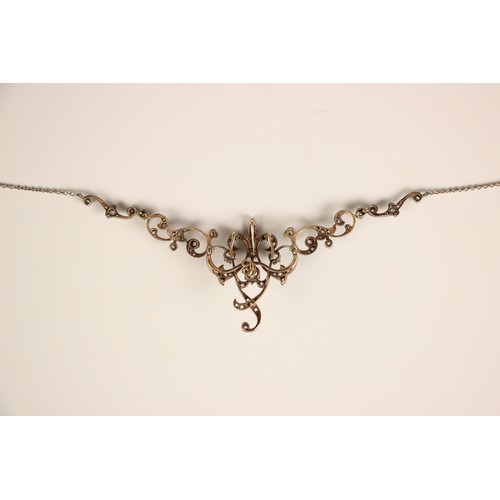 192 - A late 19th century diamond swag necklace/brooch, the central openwork detachable brooch with four o... 