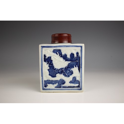 713 - A Chinese porcelain blue and white tea caddy, 18th century, of rectangular form and relief decorated... 