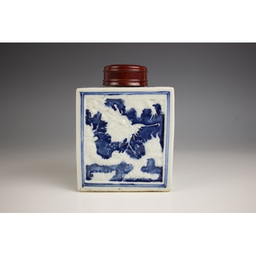 713 - A Chinese porcelain blue and white tea caddy, 18th century, of rectangular form and relief decorated... 