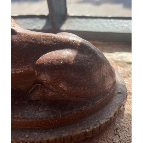 818 - A salt glazed stoneware lion, 19th century, modelled recumbent on an inverted rectangular plinth, 20... 