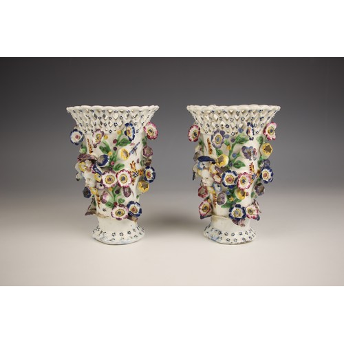 814 - A pair of Bow porcelain frill vases, 18th century, each of flared cylindrical form, the pierced rim ... 